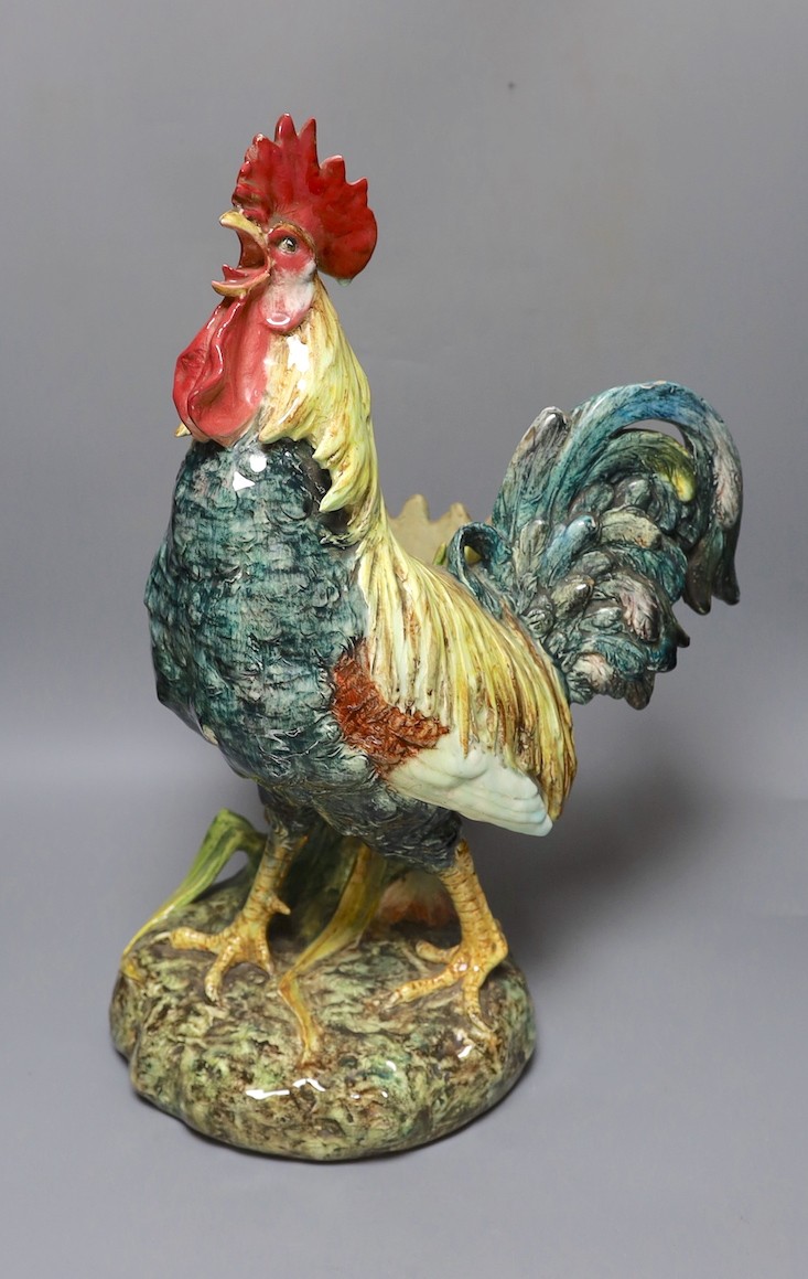 A large Continental majolica ‘cockerel’ planter/vase, 55cms high.